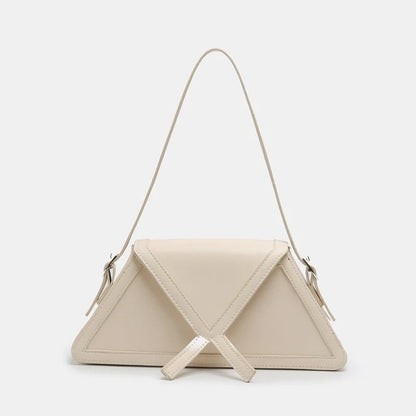 Stitching contrast trapezoid shoulder bag in black, beige, blue, and orange with magnetic buckle closure