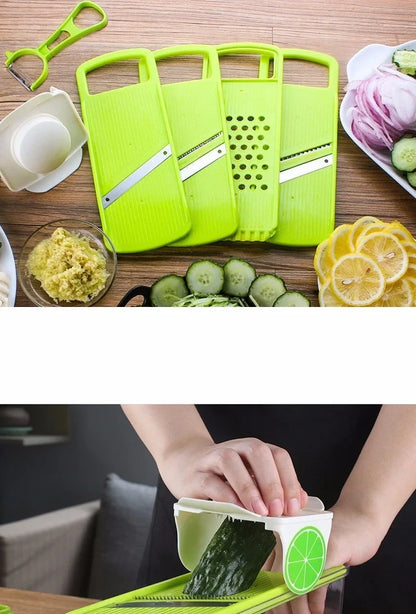 Multi-function stainless steel vegetable slicer with four blades, hand protector, and clear collection box, 26x10x10cm size