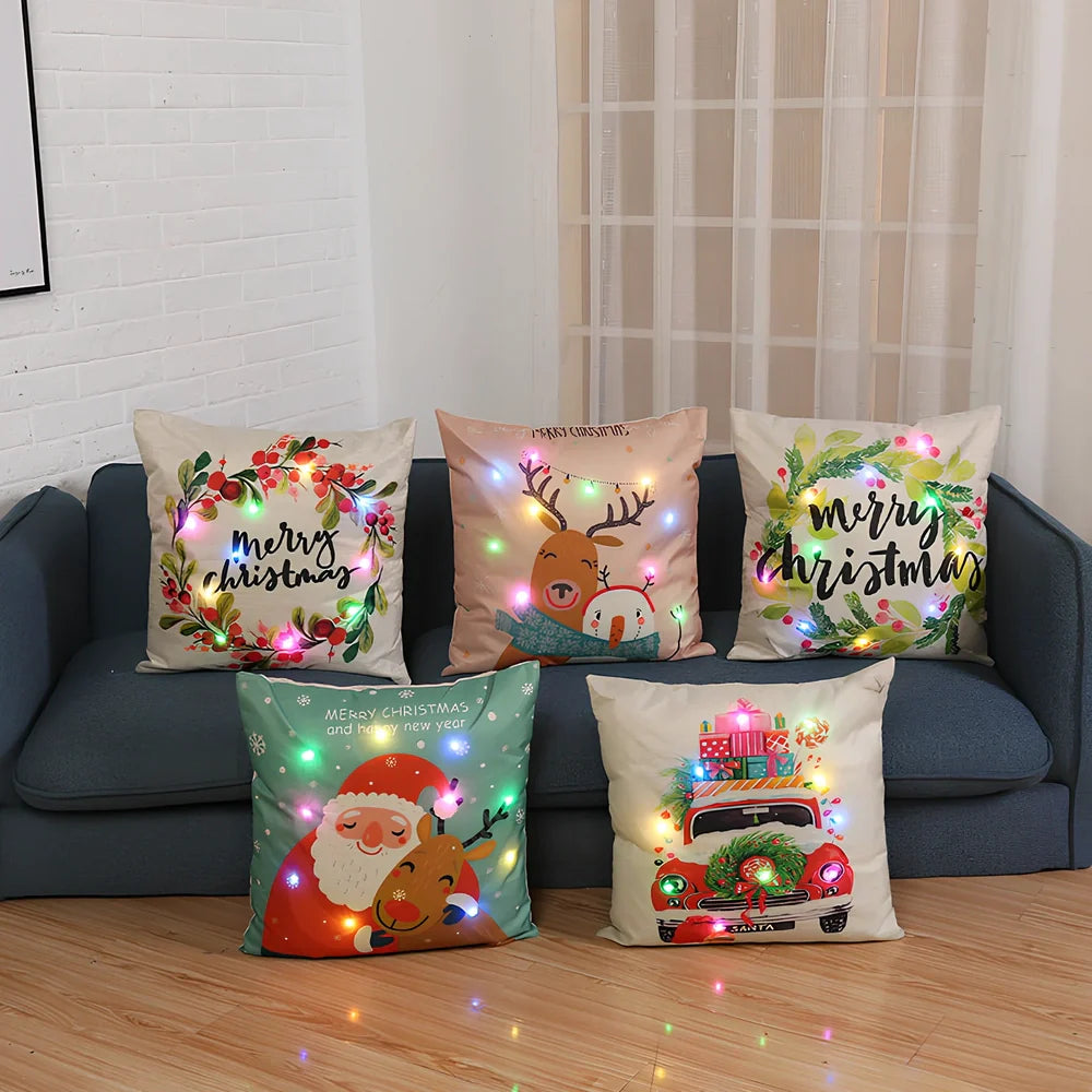 45cm square Christmas cushion with linen cover and battery-operated lighting showing festive design