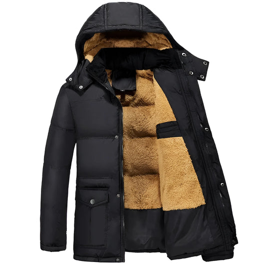 Man wearing a black velvet double-breasted padded winter jacket with a hood.