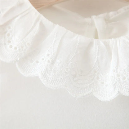 Baby girl two-piece cotton dress set with long-sleeve top and suspender skirt in yellow or pink.
