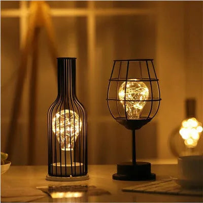 Minimalist hollow iron table lamp with warm white LED light in red wine glass design