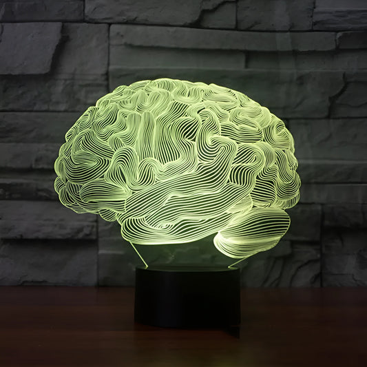 Brain-shaped 3D acrylic LED desk lamp on ABS base with remote control, showing colourful light projection.