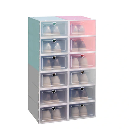 Transparent plastic shoe box showing stackable design and clear construction