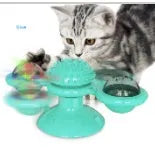 Cat rotating windmill toy with suction base, two transparent bins, blue and yellow-green TPR body.