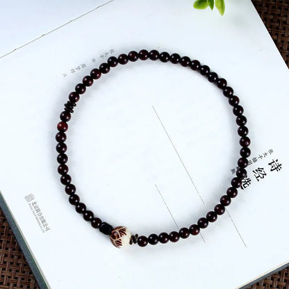 Natural rosewood double-ring bracelet with hand-knitted construction and retro floral design