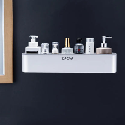 Plastic bathroom wall shelf with hole-free installation in a grey finish, holding shampoo and shower gel bottles.