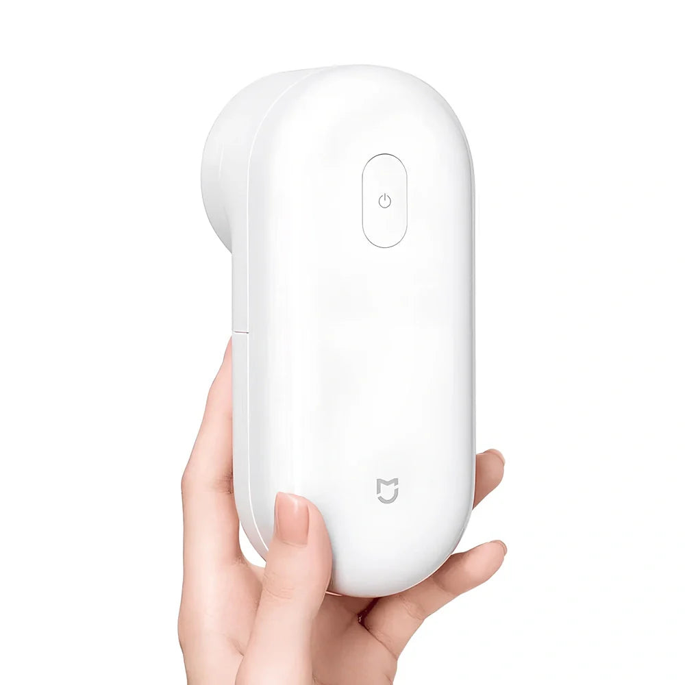 White plastic electric shaver with bulb removal function measuring 145mm length