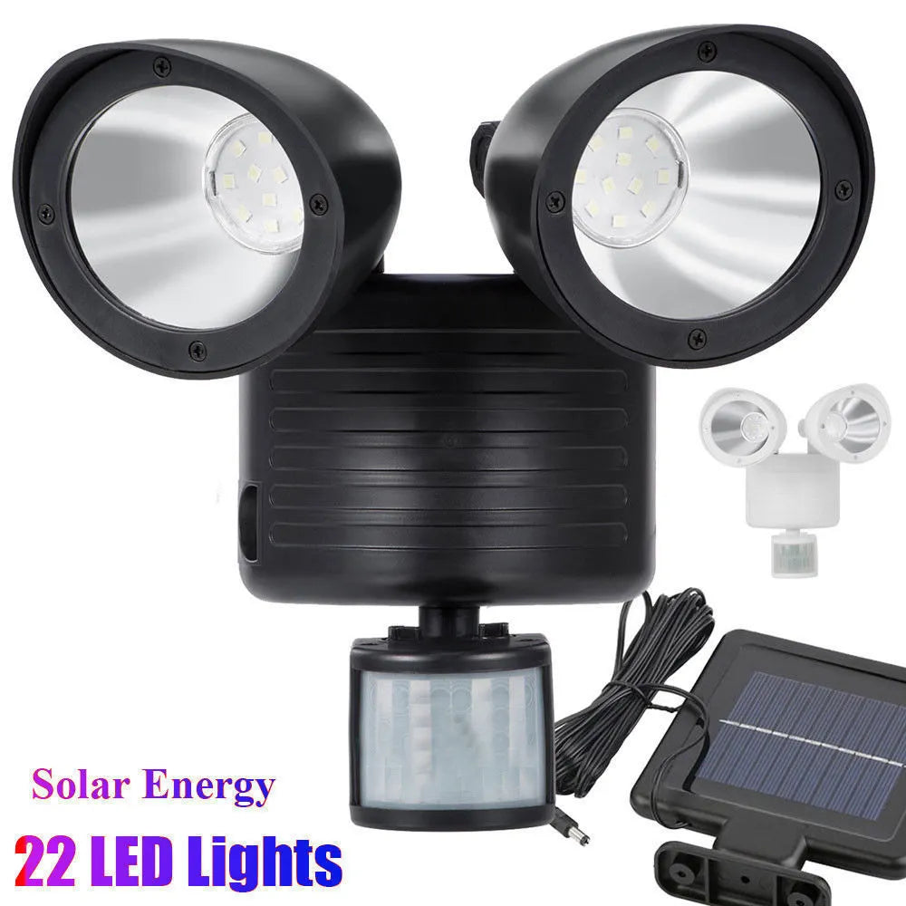 Black dual-head solar security spotlight with motion sensor for outdoor wall mounting