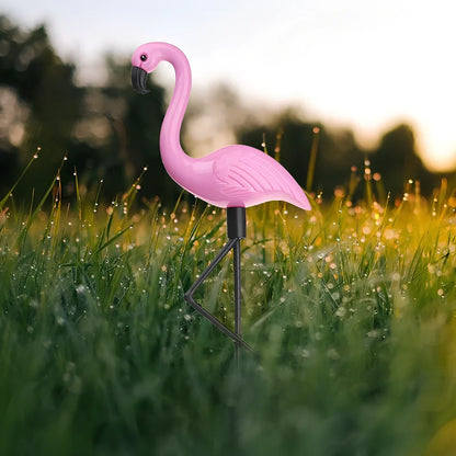 Pink flamingo-shaped solar garden light measuring 52.5cm tall with solar panel top