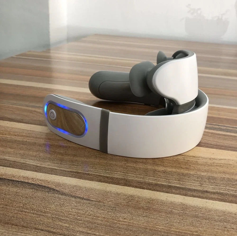 White shoulder neck massager with four rotating heads for mechanical kneading action