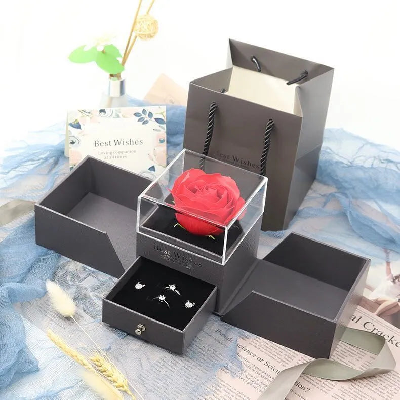 Blue jewellery gift box with plastic eternal flower decoration for Valentine's Day accessories storage