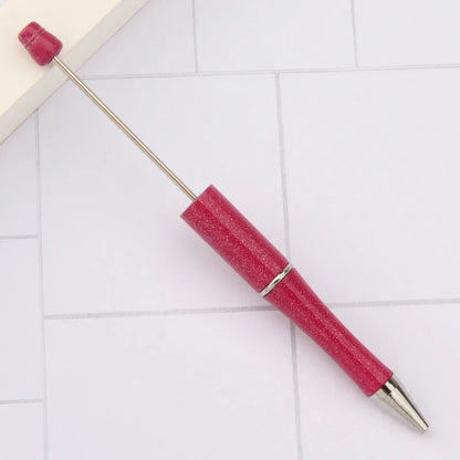 Rotating bead ballpoint pen in gradient colour with ABS plastic and steel wire construction