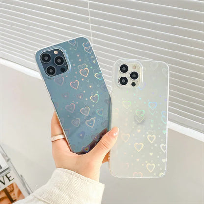 Laser colourful love silicone phone case with transparent colour and laser-etched motifs, shown on an iPhone.