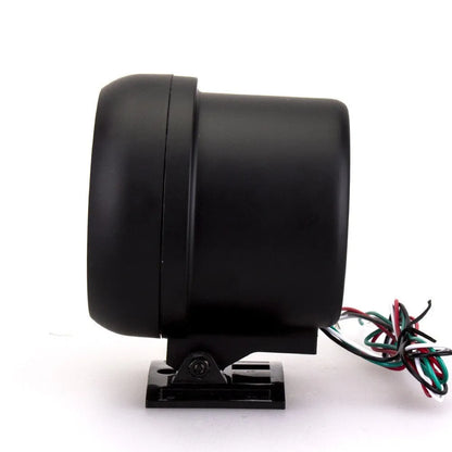 Black automotive tachometer with blue light pointer showing 0-8000 RPM scale.