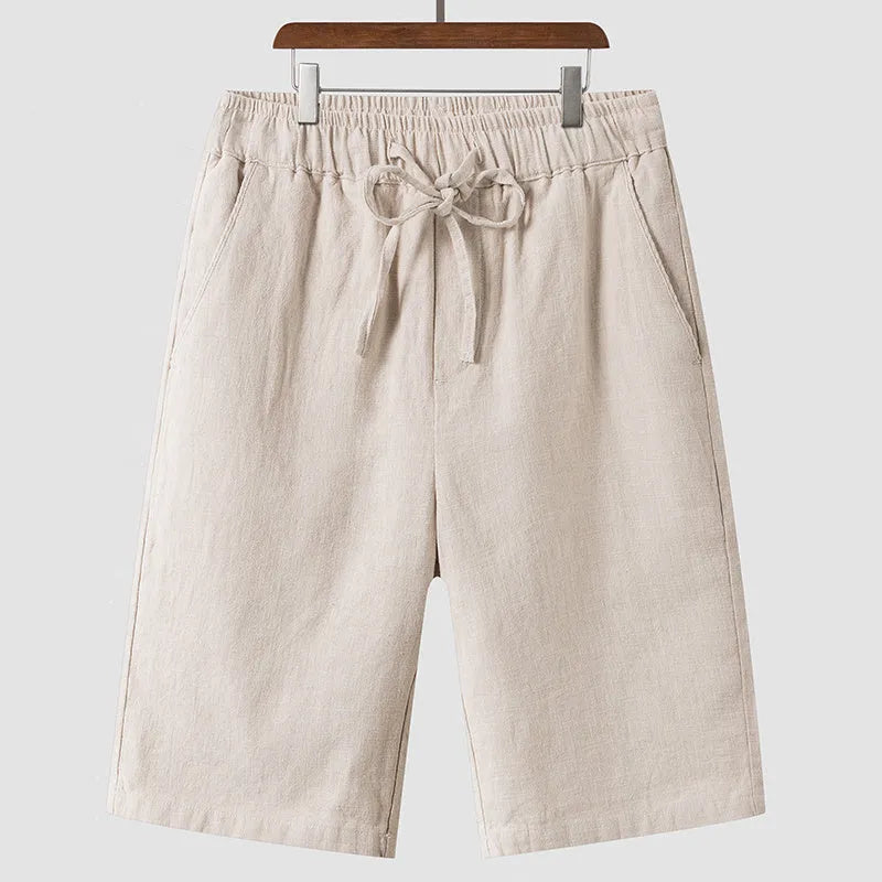 Men's linen casual shorts with elastic waistband in loose cropped design showing beige colour option