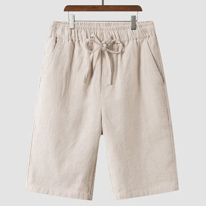 Men's linen casual shorts with elastic waistband in loose cropped design showing beige colour option