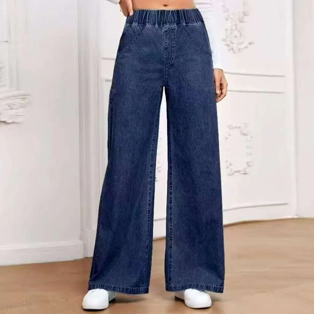 Light blue washed wide-leg denim trousers with mid waist and zip placket for plus-size youth wear