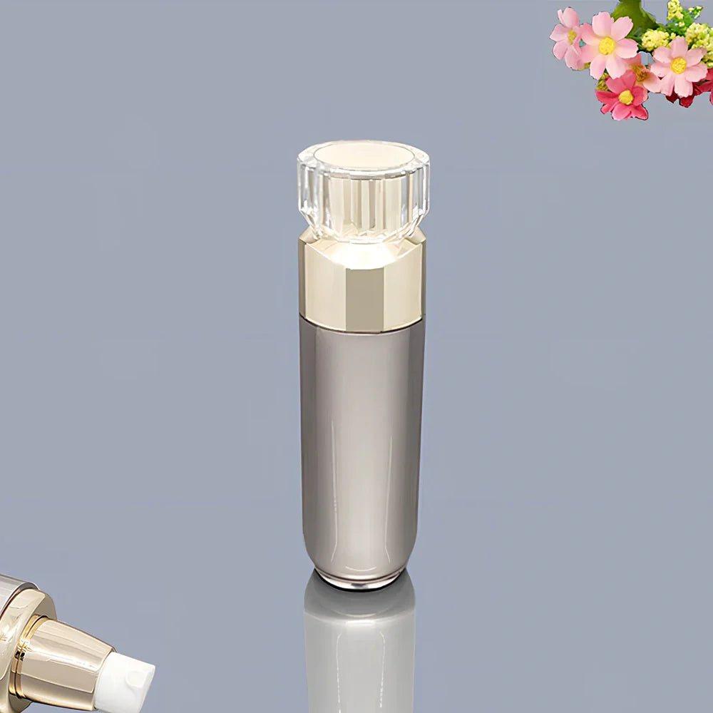 Acrylic cosmetics bottles in champagne gold and brushed white with vacuum sealing, various sizes from 5g to 120ml