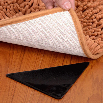 Secure rug grippers with polymer technology to prevent curling, slipping, and tripping on hardwood, tile, and other floor surfaces