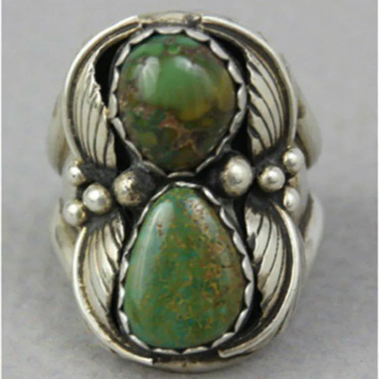 Geometric turquoise alloy ring with electroplated finish showing inlaid patterns, available in UK sizes 6-10
