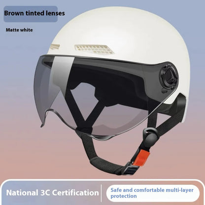3C certified electric motorcycle helmet in polypropylene with sun visor, shown in Ice Crystal Gray colour option
