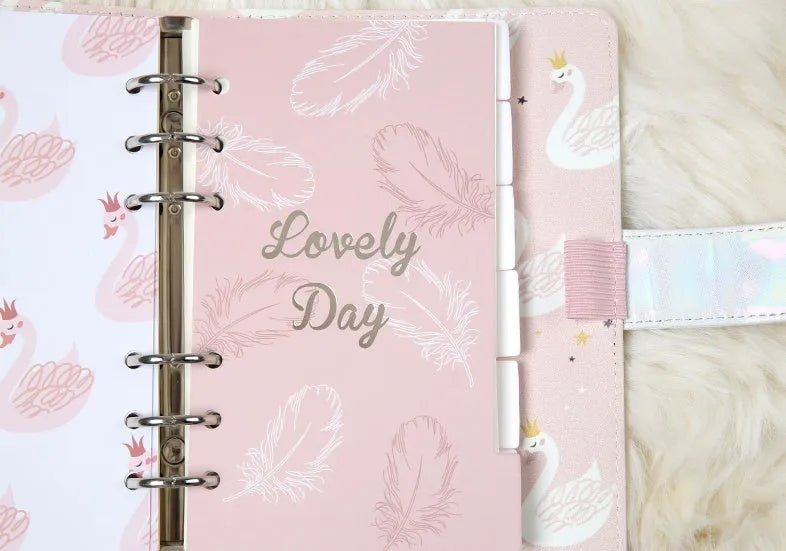 Set of six white A6 separator pages with colourful 'Swan handbook' design, showing front and back with index tabs.