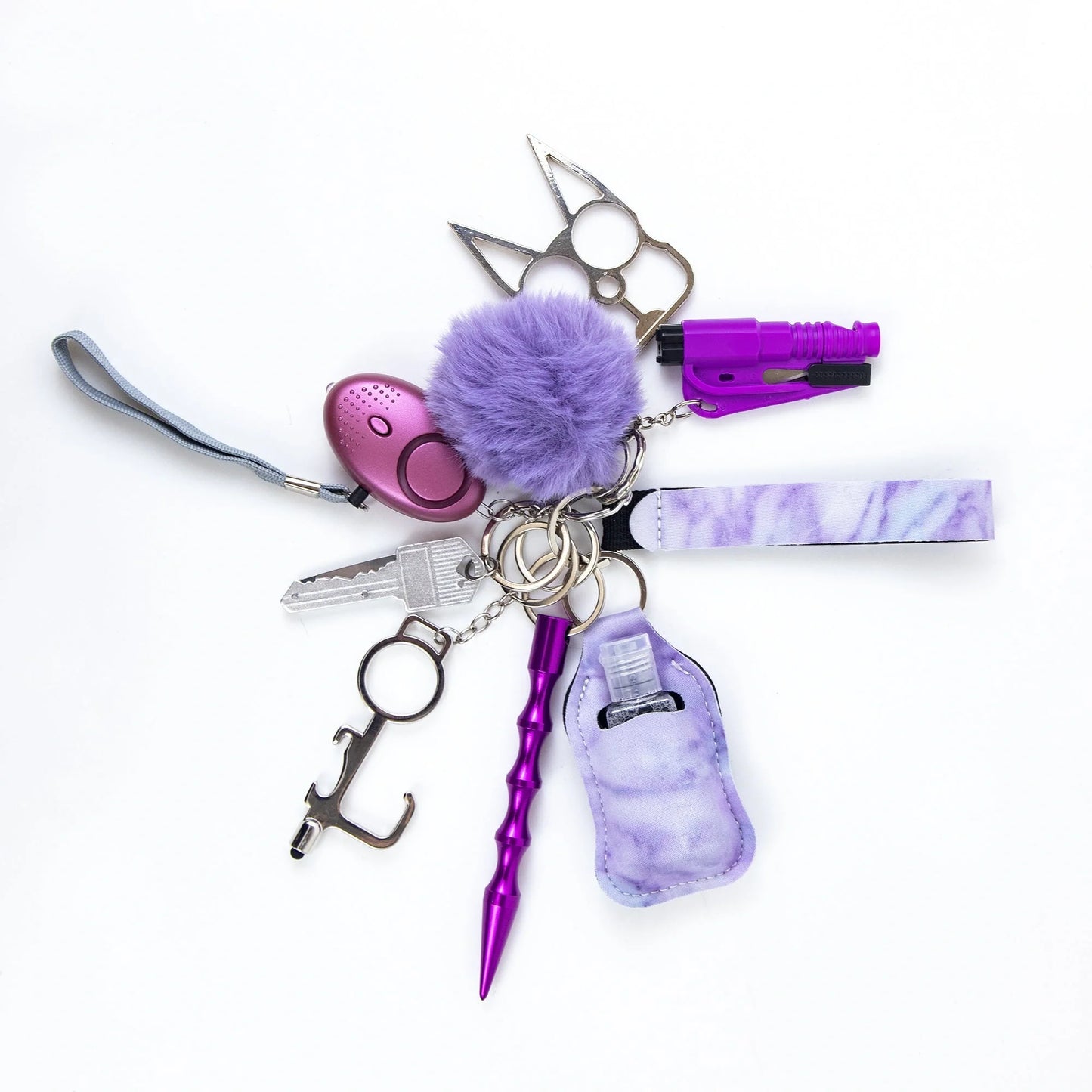 Self-defense keychain set for women with 11 safety tools including alarm and window breaker