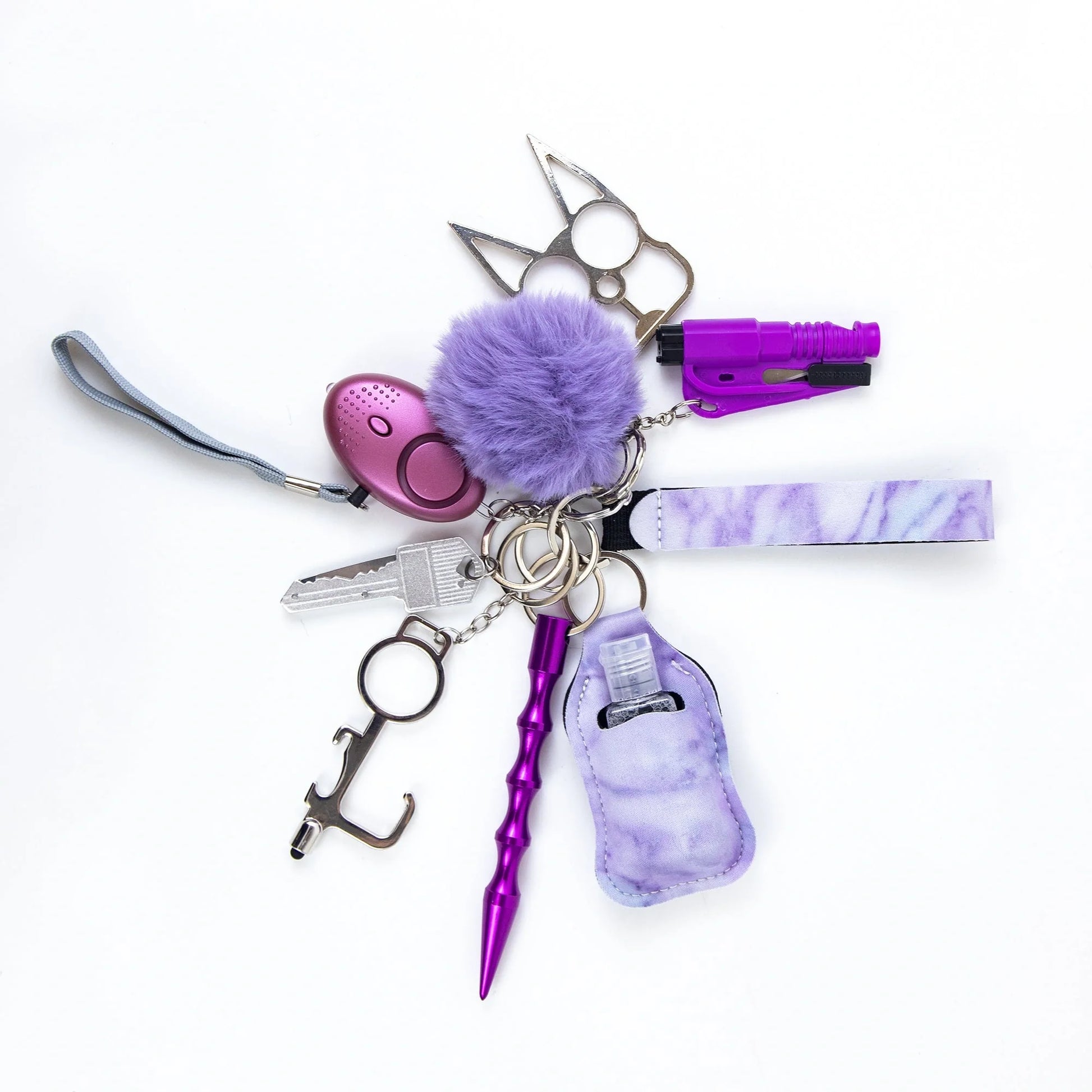 Self-defense keychain set for women with 11 safety tools including alarm and window breaker