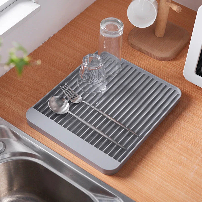Sleek dish drainer tray made of high-quality ABS material with contemporary diatom mud drainage design, suitable for draining dishes and storing kitchen items