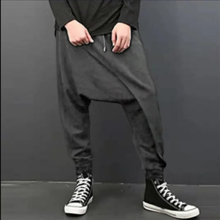 Loose harem pants in black, grey, and light grey cotton with drop crotch and baggy fit