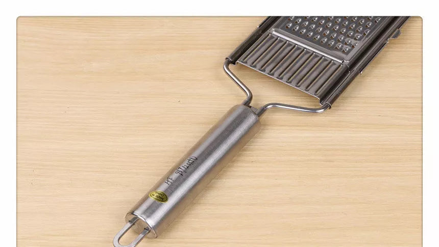 Stainless steel grater and slicer set with non-slip handle for efficient kitchen prep