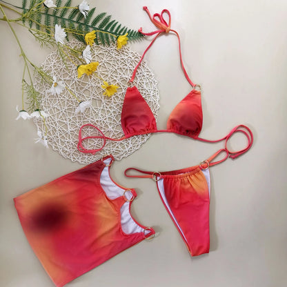 Tie-dye three-piece halter bikini swimwear set with gradient colour pattern, showing top, pants, and skirt components