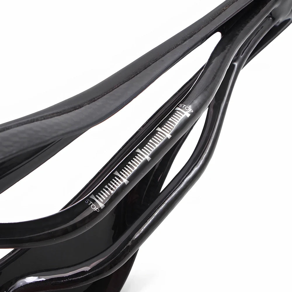 Carbon fibre bicycle saddle with 272mm length and 146mm width in black finish options