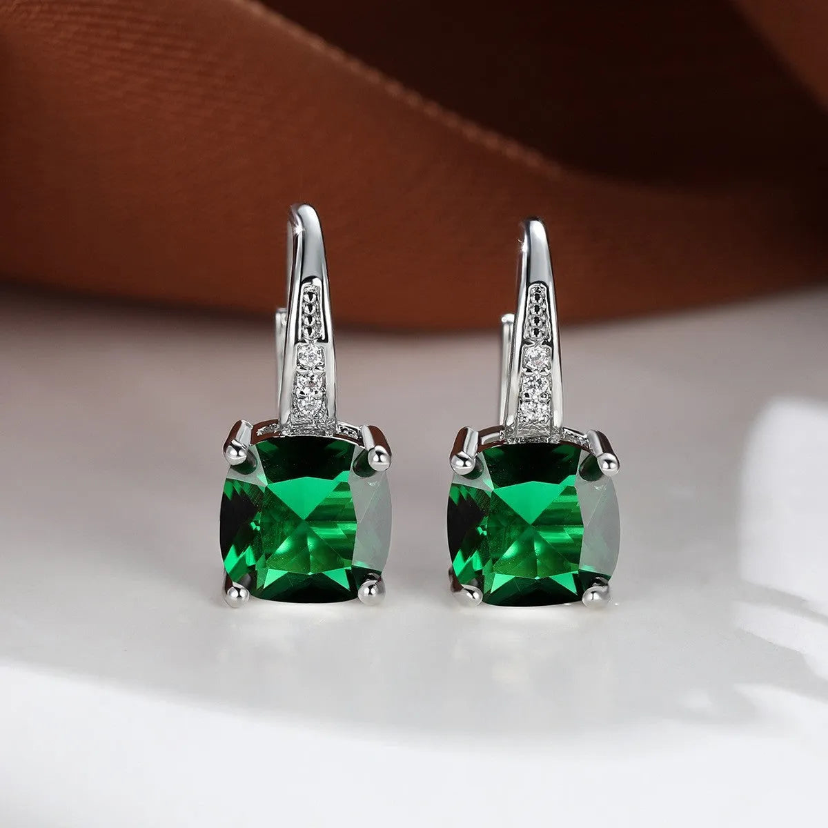 Square zircon inlaid ear hook earrings with geometric design and electroplated finish in golden tone