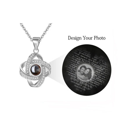 Four-leaf clover diamond necklace with hidden love words projection feature in S925 sterling silver