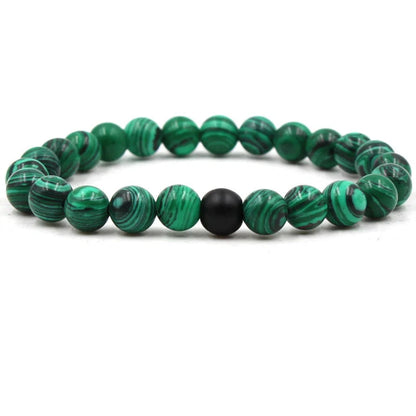 Elegant malachite stone bracelets with unique textures and patterns, perfect for a stylish accessory.