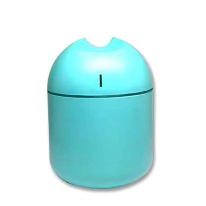 White aromatherapy humidifier with 1-litre tank and USB cable for room moisture control