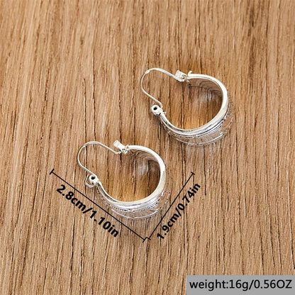 Vintage carved pattern earrings in silver alloy with geometric design