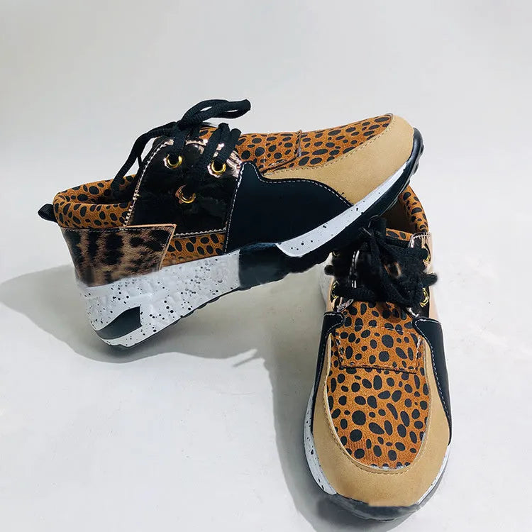 Women's casual sports shoes in black suede with wedge heel and round toe for daily wear