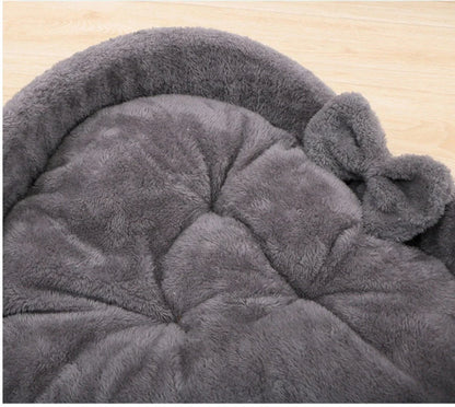 Cozy heart-shaped pet bed in grey and pink colors, suitable for cats and small dogs