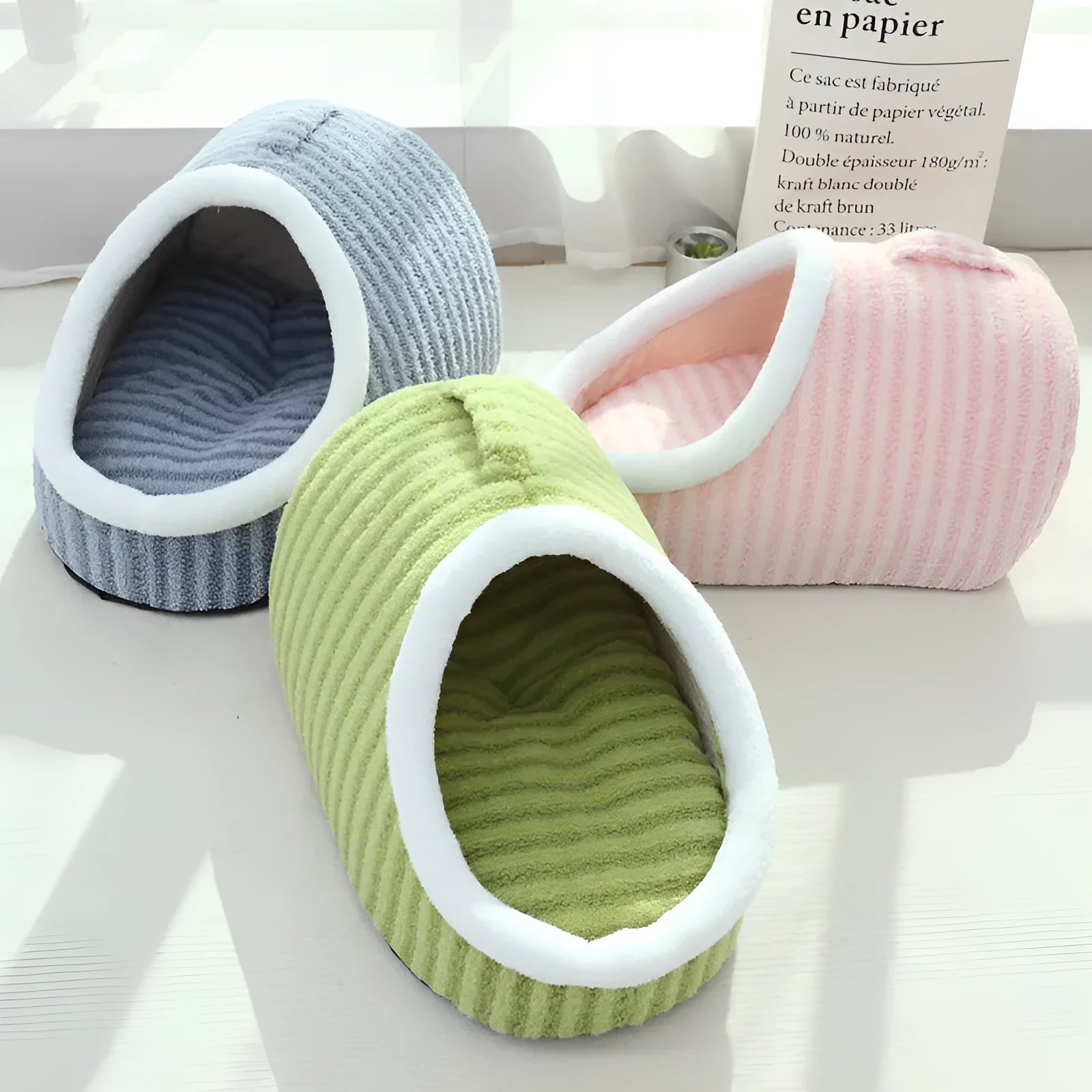 Macaron-shaped thickened cloth cat bed cage in pink, shown in a three-dimensional nest design.