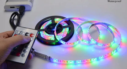 5m waterproof LED strip light with 60 LEDs per metre, white PCB 8mm wide, in white, warm white, or RGB.