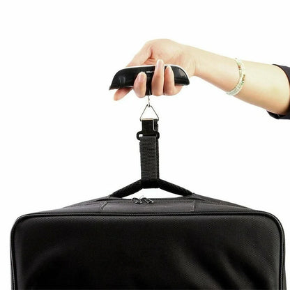 Black T-shaped electronic scales with backlit LCD display showing weight measurement