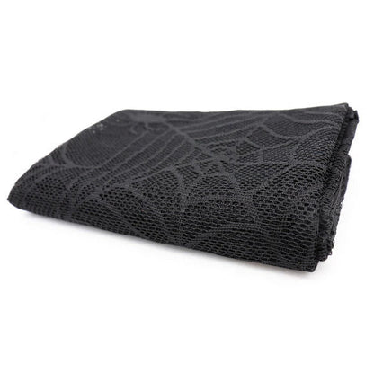 Black lace mesh Halloween tablecloth with spiderweb design, perfect for festive autumn and Halloween decor