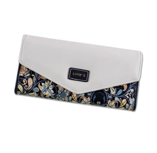 Three-fold leather wallet with buckle closure showing black colour variant, note clip visible inside compartment