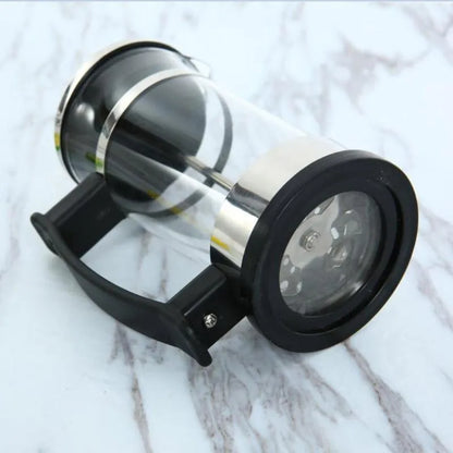 Compact manual pour over coffee maker with glass carafe and stainless steel filter, showing 350ml capacity.