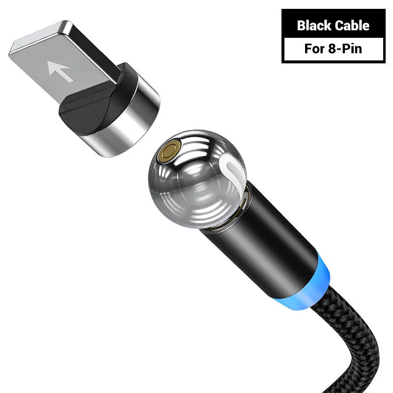 Black spherical magnetic charging cable with rotating head next to iPhone and Android phones