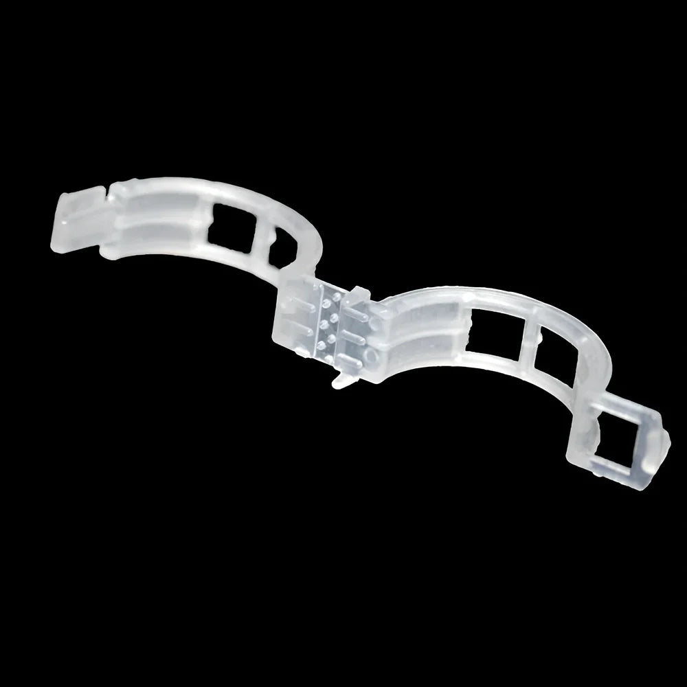 Plastic tomato plant grafting clips showing 3-4cm diameter and smooth surface texture