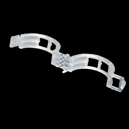 Plastic tomato plant grafting clips showing 3-4cm diameter and smooth surface texture